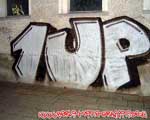 1UP (MITTE)